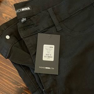 Black high waisted flare jeans.